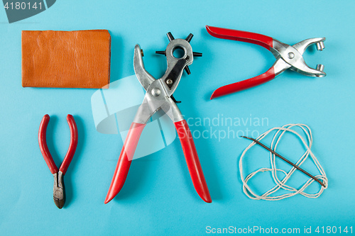 Image of Working tools leather craftsman top views