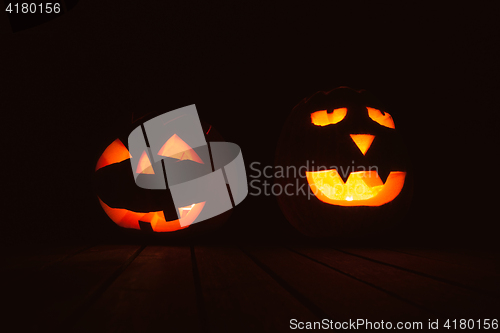 Image of Halloween pumpkin lanterns with evil faces