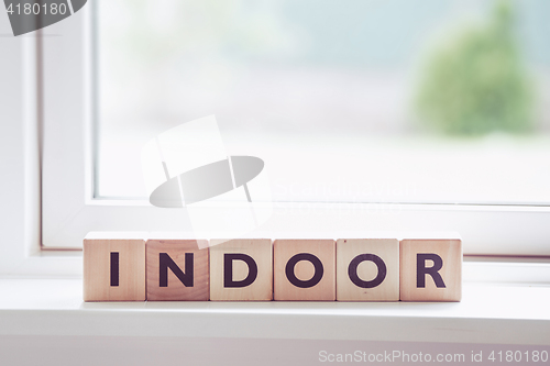 Image of Indoor sign made of wooden cubes