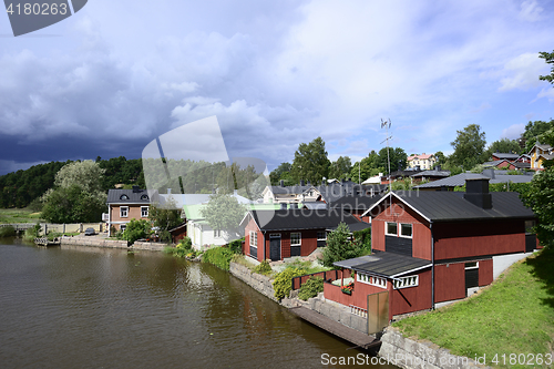 Image of wooden houses by the river in old part of Porvoo, Finland