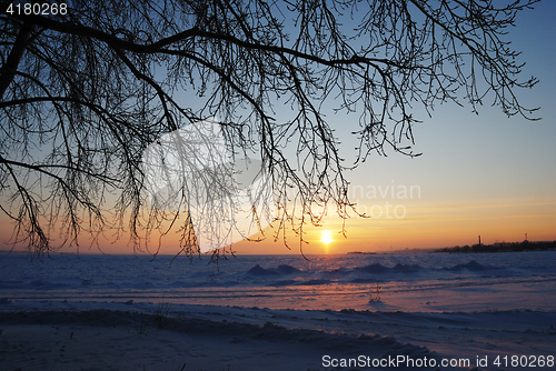 Image of sunset in the winter on Lake Onega