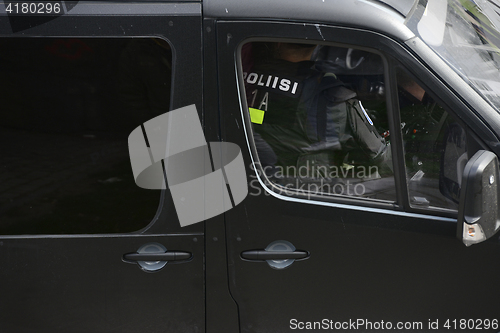 Image of police in the car while on duty, Helsinki, Finland