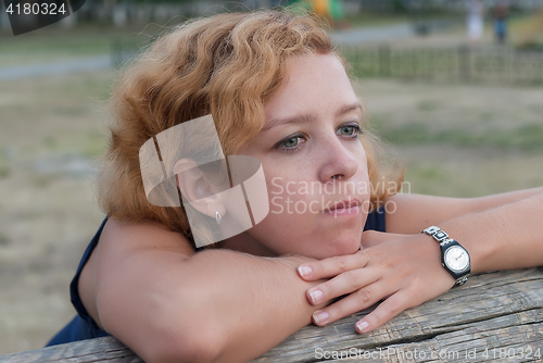 Image of Attractive young blonde woman with freckles