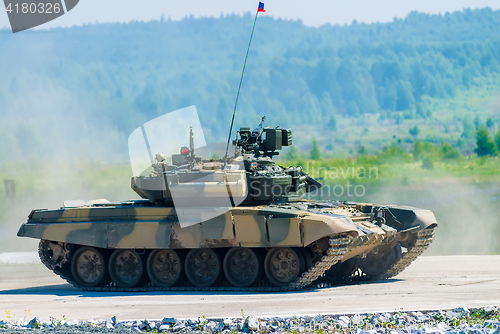 Image of Tank T-80s in motion