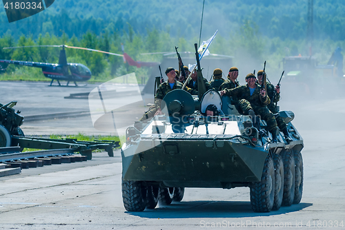 Image of BTR-82A armoured personnel carrier with soldiers