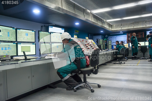 Image of Engineers in control room of Tobolsk Polymer