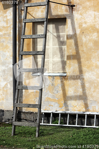 Image of Two Old Wooden Ladders