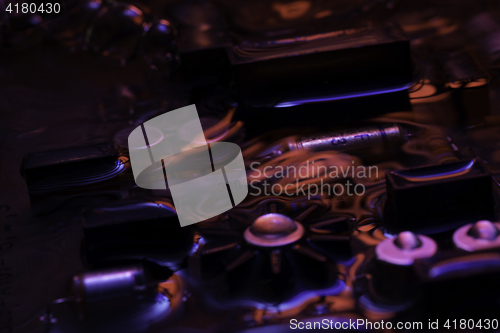 Image of vintage circuit board with red and blue reflection