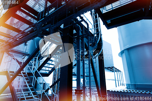 Image of Industrial zone, Steel pipelines and cables in blue tones