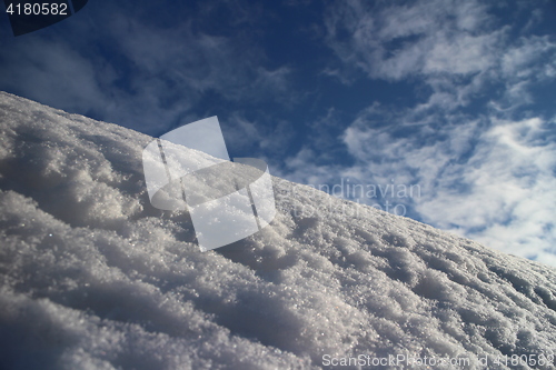 Image of  white snow on mountain slope