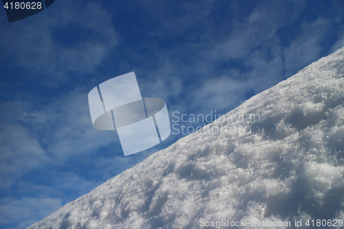 Image of  mountain slope white snow blue sky