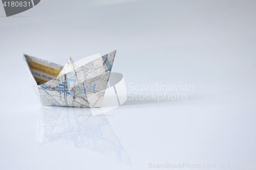 Image of Paper ship from the map on a white