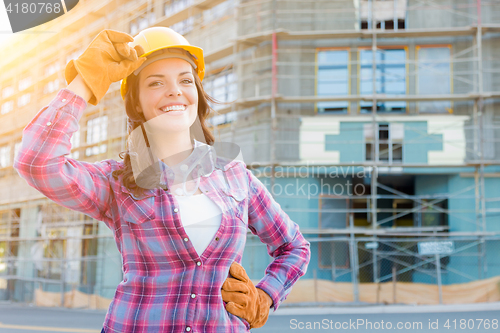 Image of Portrait of Young Female Construction Worker Wearing Gloves, Har