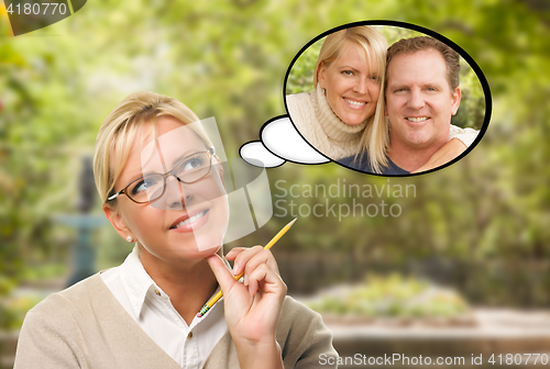 Image of Thoughtful Young Woman with Herself and Man in Thought Bubble.