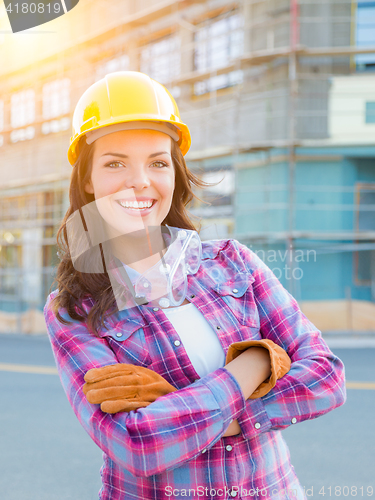 Image of Portrait of Young Female Construction Worker Wearing Gloves, Har