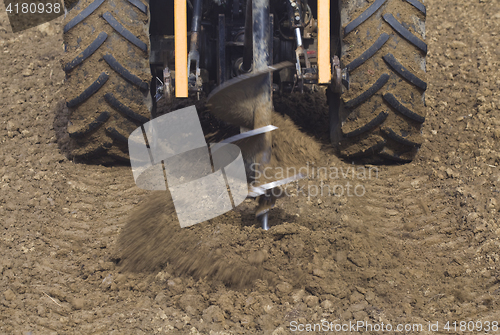 Image of Drilling Hole with Tractor