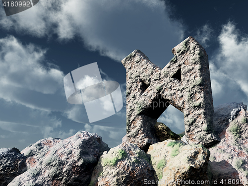 Image of rune rock under cloudy blue sky - 3d illustration