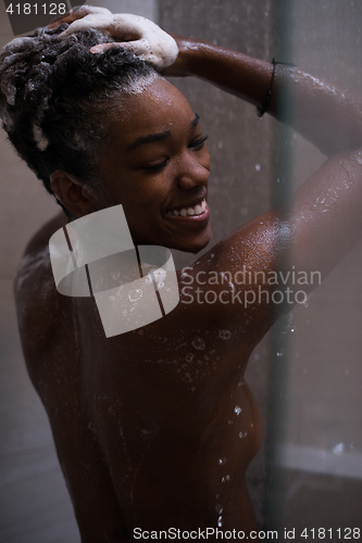 Image of African American woman in the shower