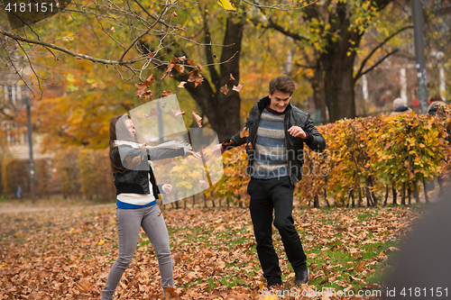 Image of Happy young Couple in Autumn Park