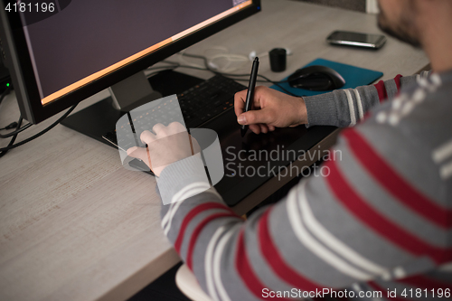 Image of graphic designer at work