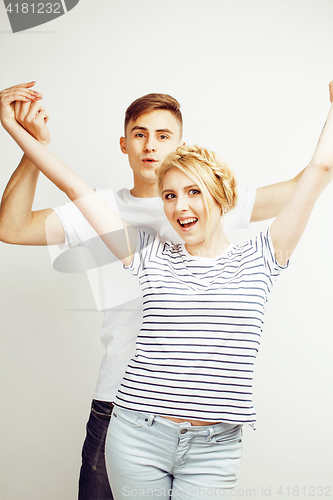 Image of young pretty teenage couple, hipster guy with his girlfriend happy smiling and hugging isolated on white background, lifestyle people concept