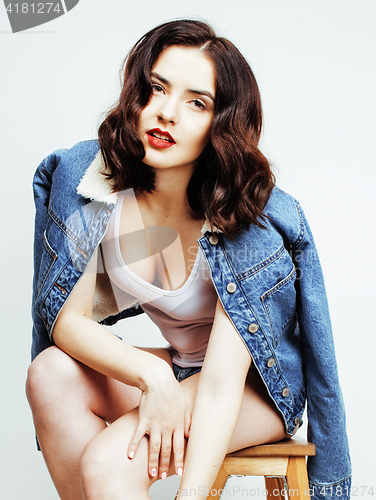 Image of young pretty stylish hipster girl posing emotional isolated on white background happy smiling cool smile, lifestyle people concept 