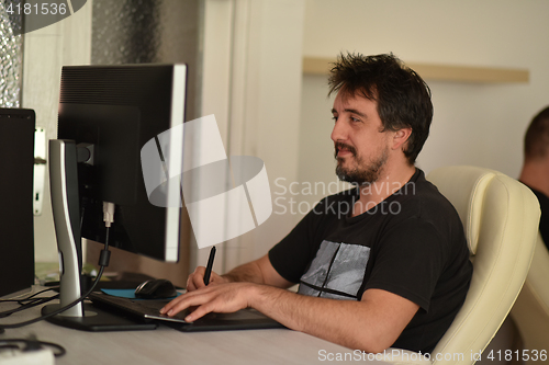 Image of graphic designer in the office