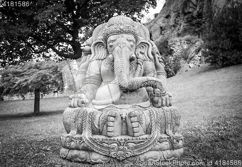 Image of Ganesha statue in a beautiful mountain garden