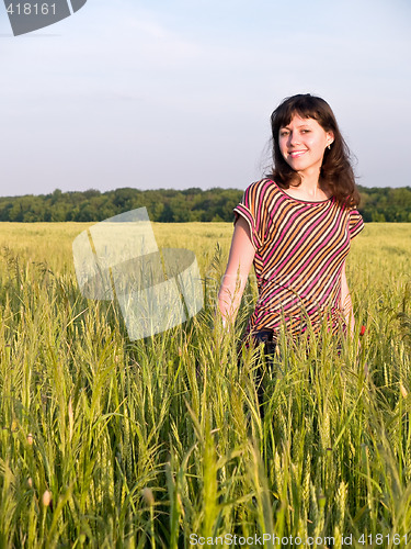 Image of Smiling Teen Girl in Field