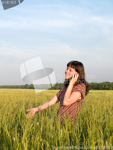 Image of Beautiful Teen Girl Talking Mobile Phone Field