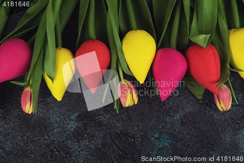 Image of Handmade and real tulips on darken