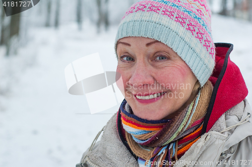 Image of Portrait of a woman in a winter park