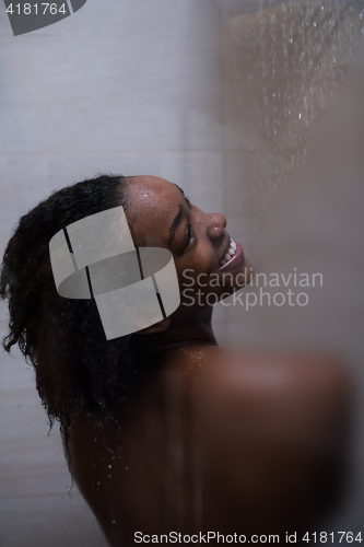 Image of African American woman in the shower