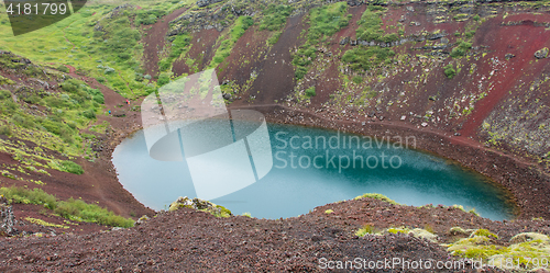 Image of Kerid is a crater lake of a turquoise color - Iceland