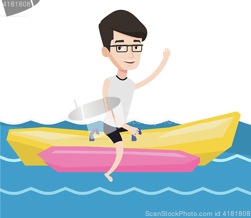 Image of Tourists riding a banana boat vector illustration.