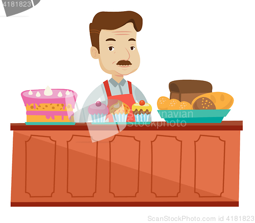 Image of Worker standing behind the counter at the bakery.