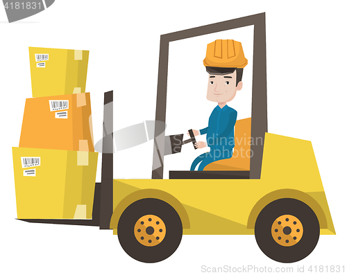 Image of Warehouse worker moving load by forklift truck.