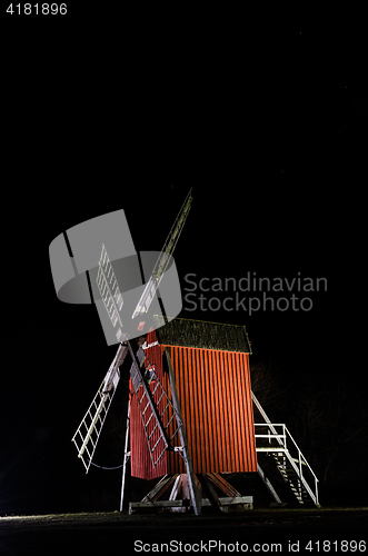 Image of Illuminated old traditional windmill in Sweden