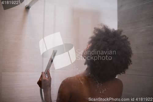 Image of African American woman in the shower