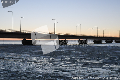 Image of Ice floe by a bridge detail