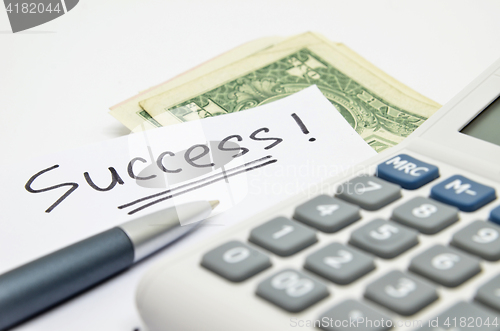 Image of Calculator, money and success word