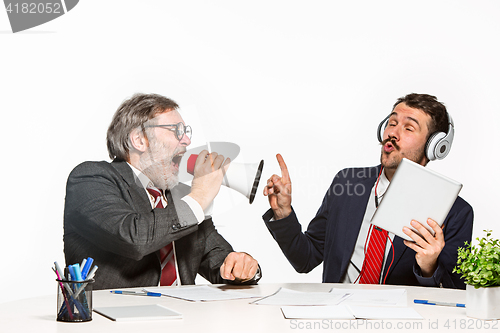 Image of The two colleagues working together at office on white background.