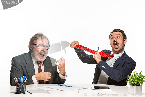 Image of The two colleagues working together at office on white background.