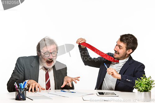 Image of The two colleagues working together at office on white background.