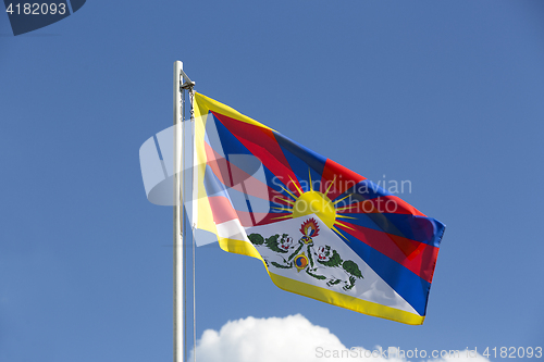 Image of National flag of Tibet on a flagpole