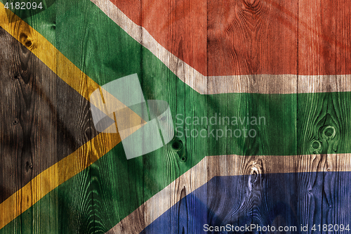 Image of National flag of South Africa, wooden background