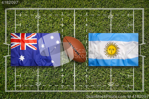 Image of Australia vs. Argentina\r flags on rugby field