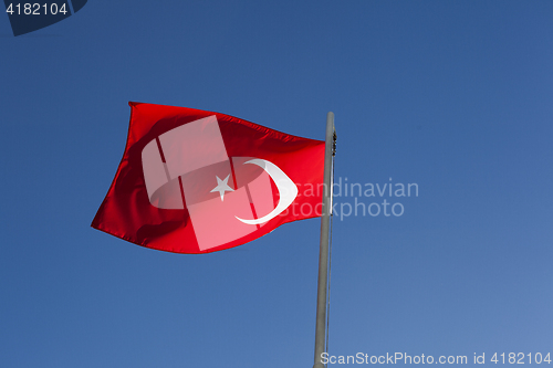 Image of National flag of Turkey on a flagpole