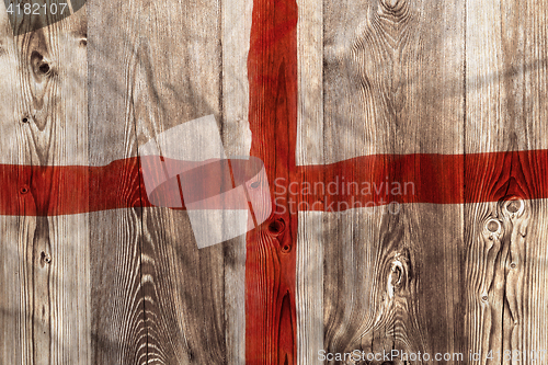 Image of National flag of England, wooden background