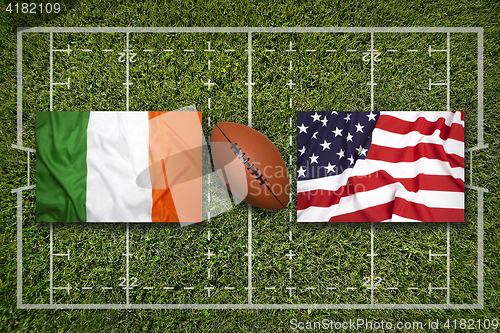 Image of Ireland vs. Scotland\r\rIreland vs. USA flags on rugby field